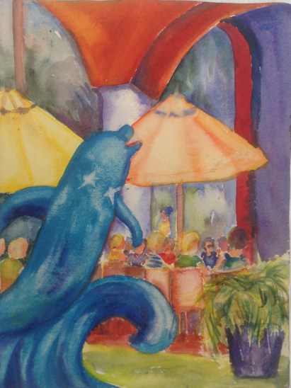 Blue Dolphin sculpture in front of Mangoes